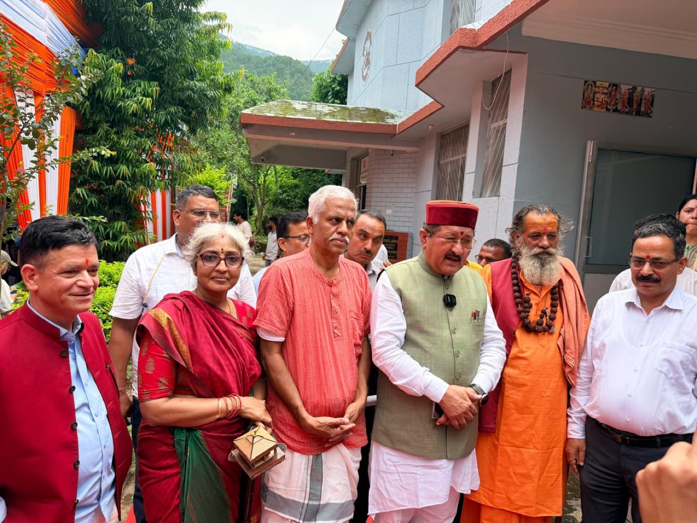 Guests and trustees outside Sri Kanchi Kamakoti Shankara Hospital at its inauguration